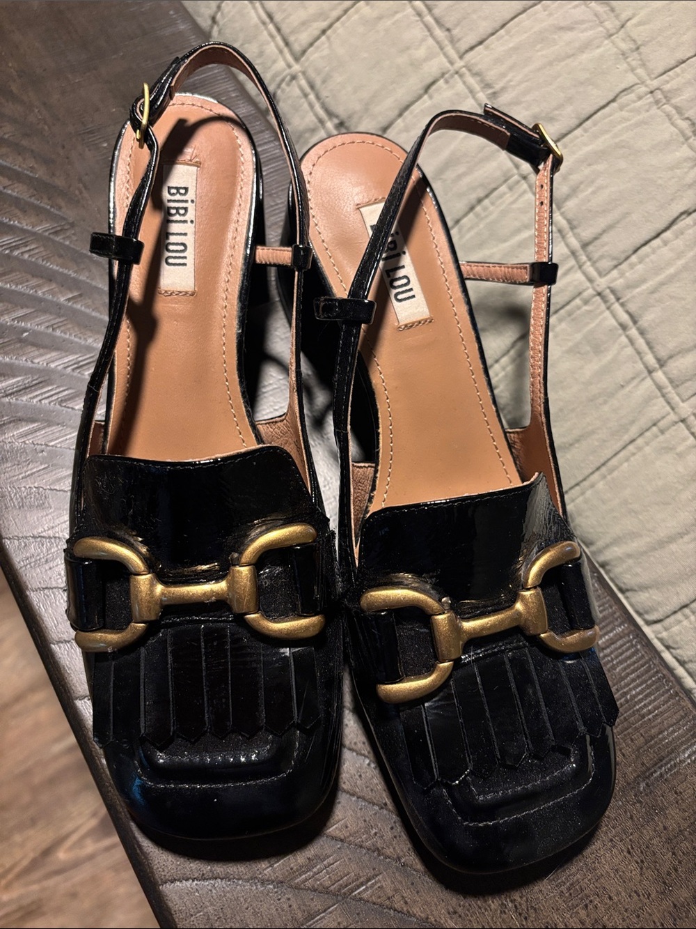 Biblou Black Patent Leather Slingback Mules with Gold Horsebit
